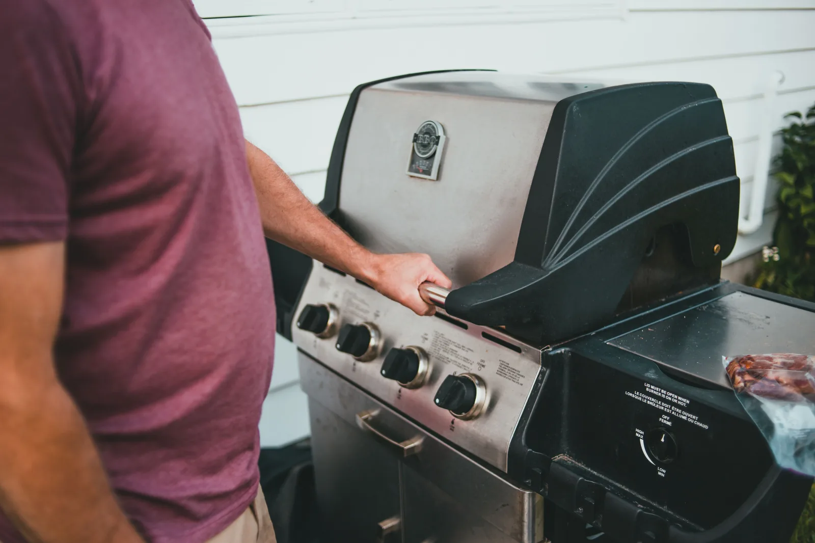 Cooking outdoors on a gas grill during a power outage