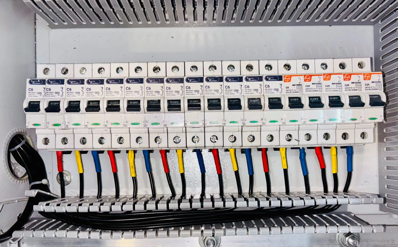 Close-up of an organized circuit breaker panel where a whole-house surge protector installs